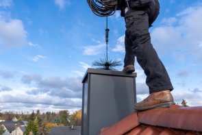 Chimney sweep Chimney sweep cleans the chimney