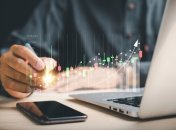 Businessman,Or,Trader,Holds,A,Digital,Pen,,Pointing,To,A Businessman,Or,Trader,Holds,A,Digital,Pen,,Pointing,To,A