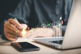 Businessman,Or,Trader,Holds,A,Digital,Pen,,Pointing,To,A Businessman,Or,Trader,Holds,A,Digital,Pen,,Pointing,To,A